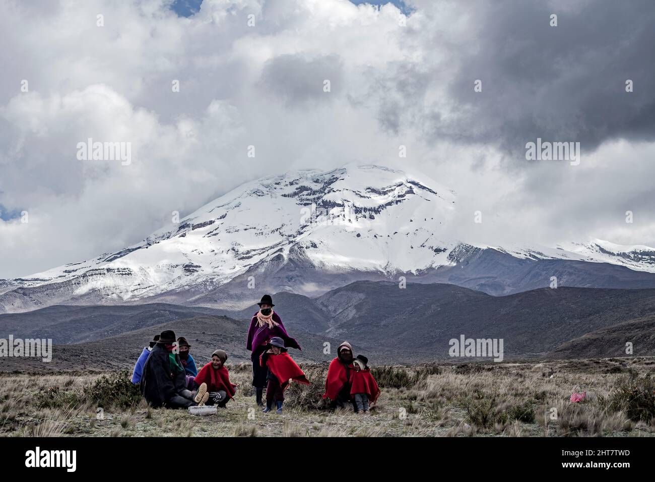 Indigenous family chimborazo landscape background ecuador latin ecuadorian Stock Photo