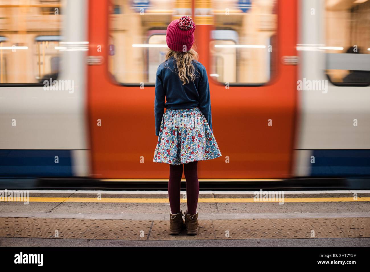 Girl waiting train on railway hi-res stock photography and images - Alamy