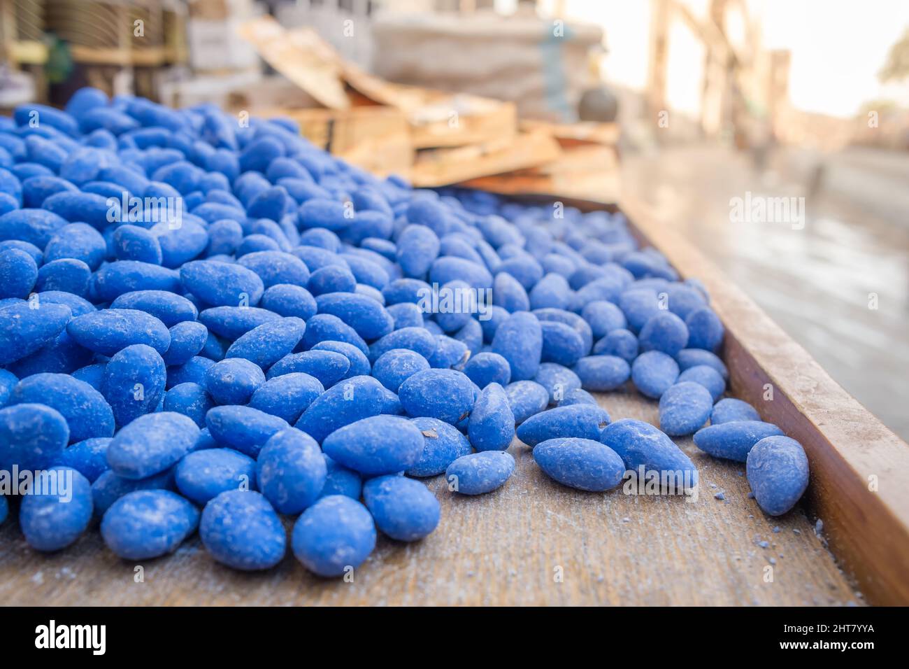 Almonds covered with a sweet blue icing for sale in Mardin town, Turkey. Stock Photo