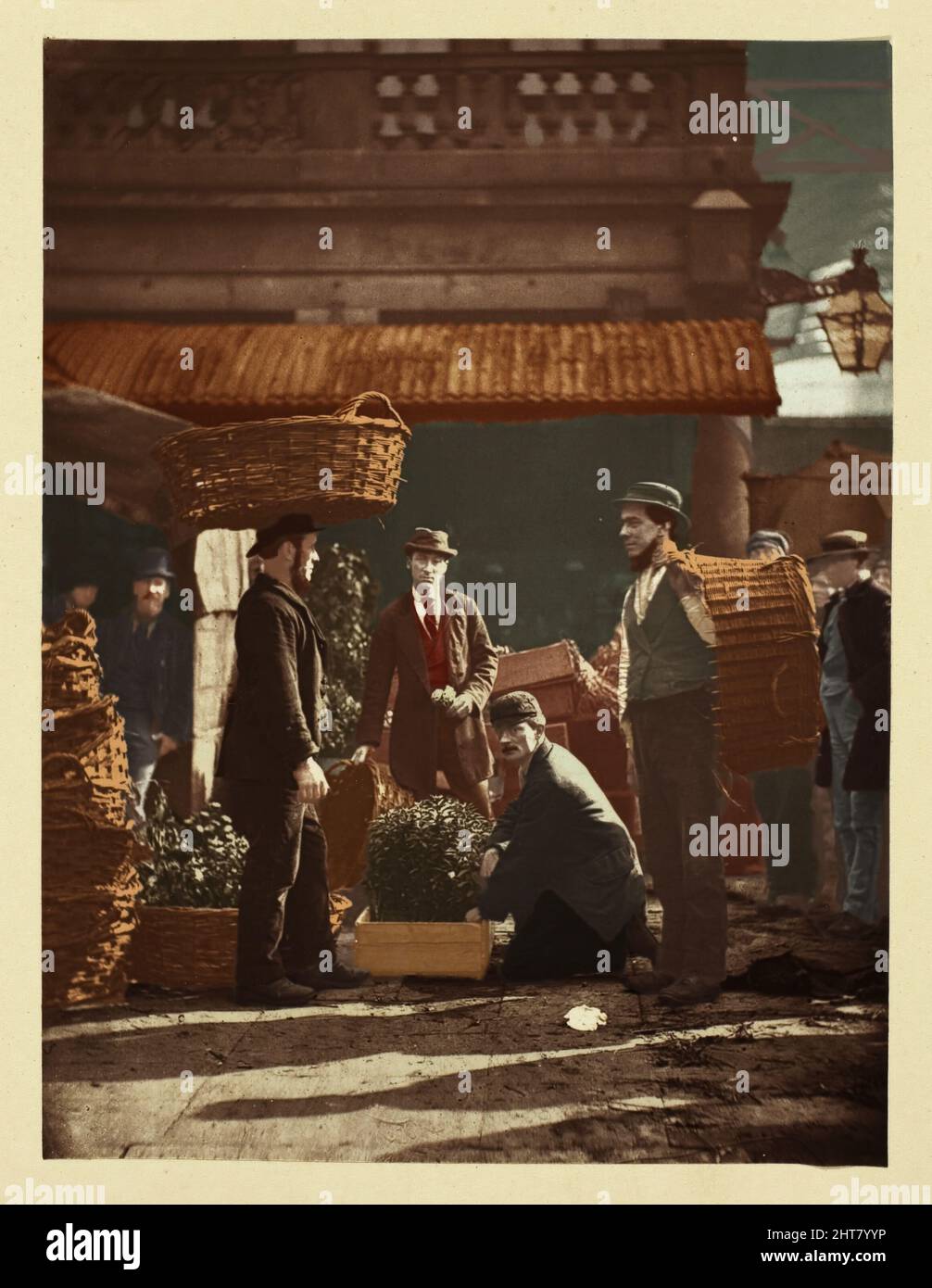 Covent Garden Labourers, 1881. A work made of woodburytype, plate 3 in the book &quot;street incidents&quot; (1881). (Colorised black and white print). Stock Photo