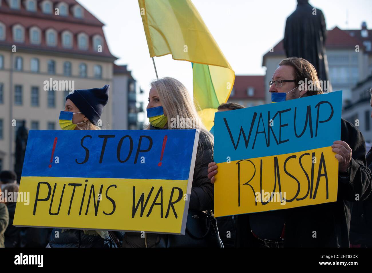Dresden, Germany. 27th Feb, 2022. Participants hold a placard reading 'Stop Putin's War' at a demonstration on Neumarkt square against the Russian attack on Ukraine. According to police, more than 3000 people came together after a call by the parties in Dresden. Credit: Daniel Schäfer/dpa-Zentralbild/dpa/Alamy Live News Stock Photo