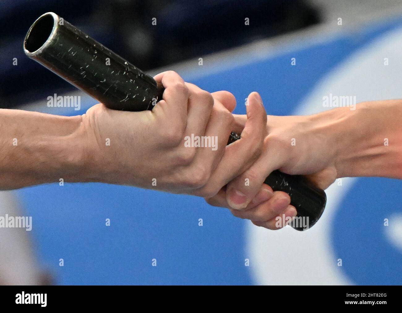 Handover baton in relay race hires stock photography and images Alamy