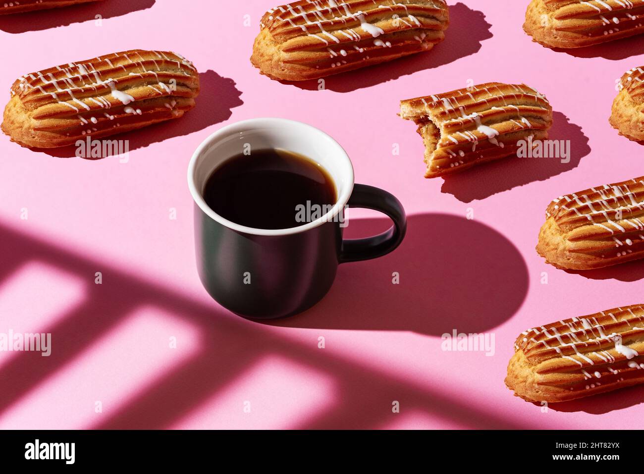 Pattern Eclair pattern of eclairs on a pink background Stock Photo - Alamy