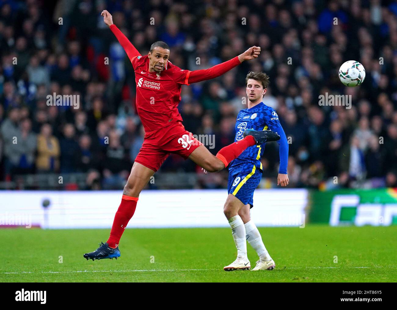 Liverpool's Joel Matip (left) and Chelsea's Mason Mount battle for the ball during the Carabao Cup final at Wembley Stadium, London. Picture date: Sunday 27th February, 2022. Stock Photo