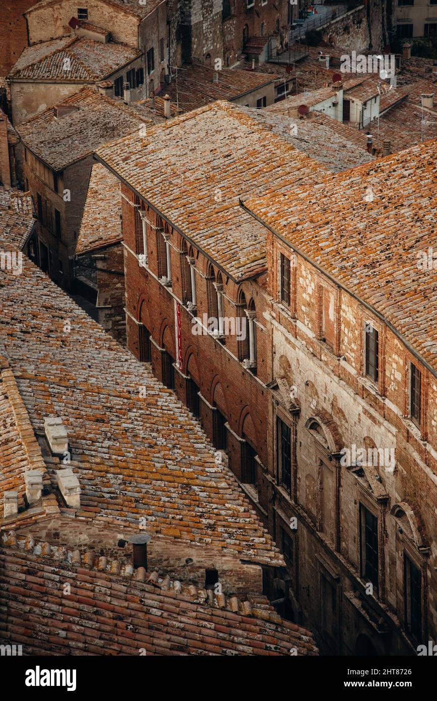 Vertical shot of the old stone buildings roofs Stock Photo - Alamy