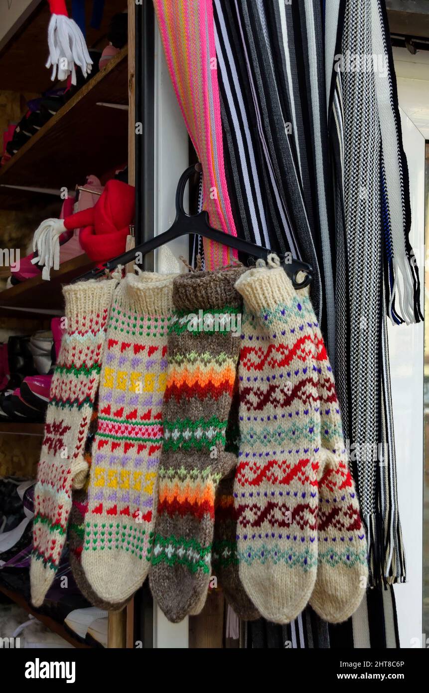 Traditional bulgarian colourful wool glove, knitted by hand in the resort of Borovets, Rila Mountain, Bulgaria Stock Photo