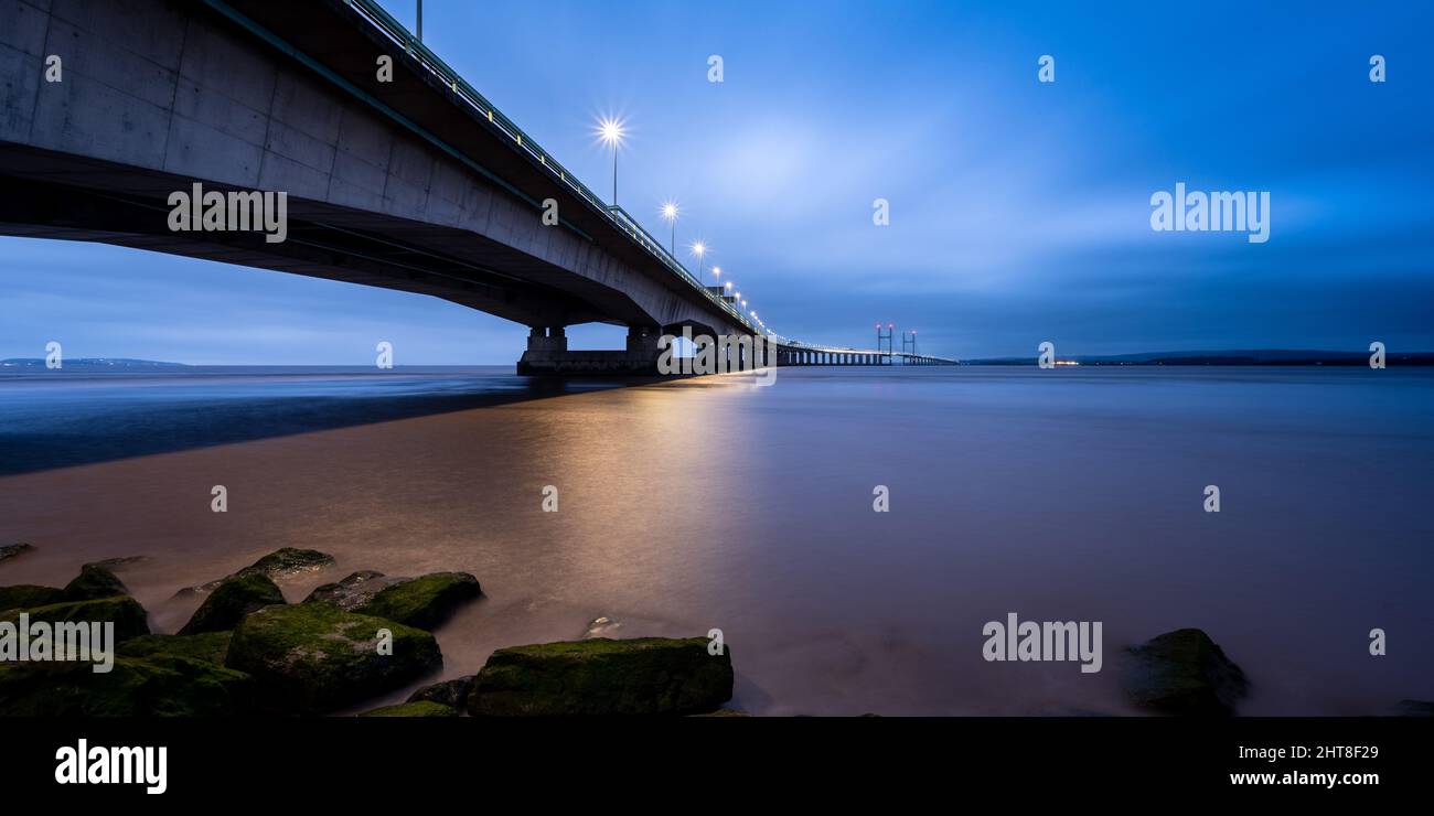 The M4 Second Severn Crossing bridge is lit at night on the Severn Estuary. Stock Photo