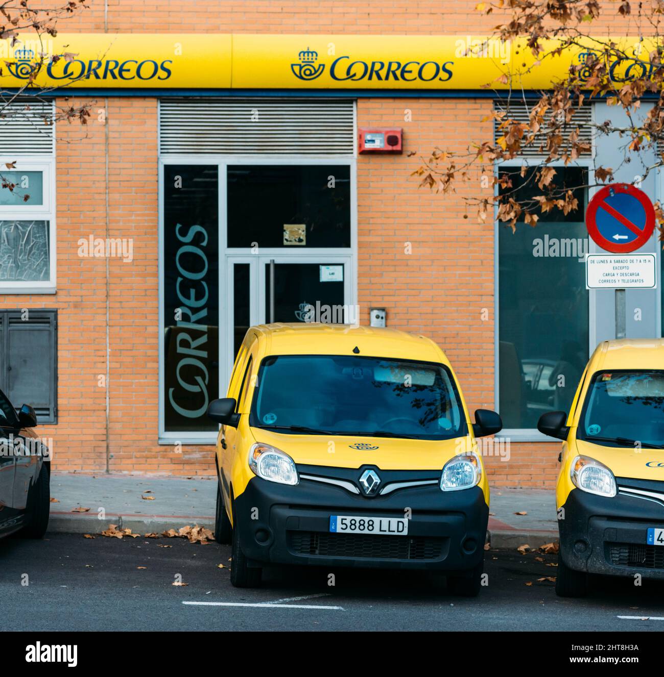Outside view at the Spanish mail office with delivery vans Stock Photo