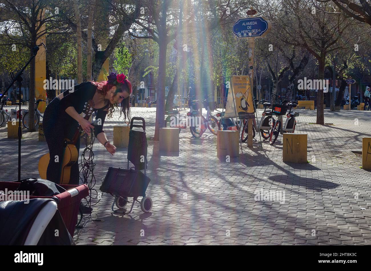 Street musician in La Alameda de Hercules Stock Photo