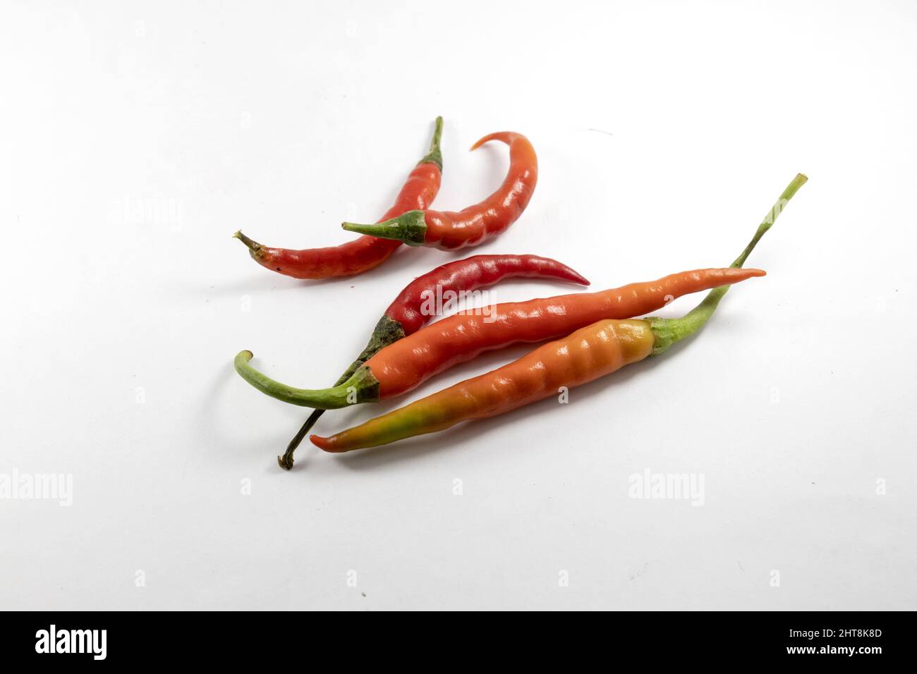 Red chilli peppers isolated on white background Stock Photo - Alamy