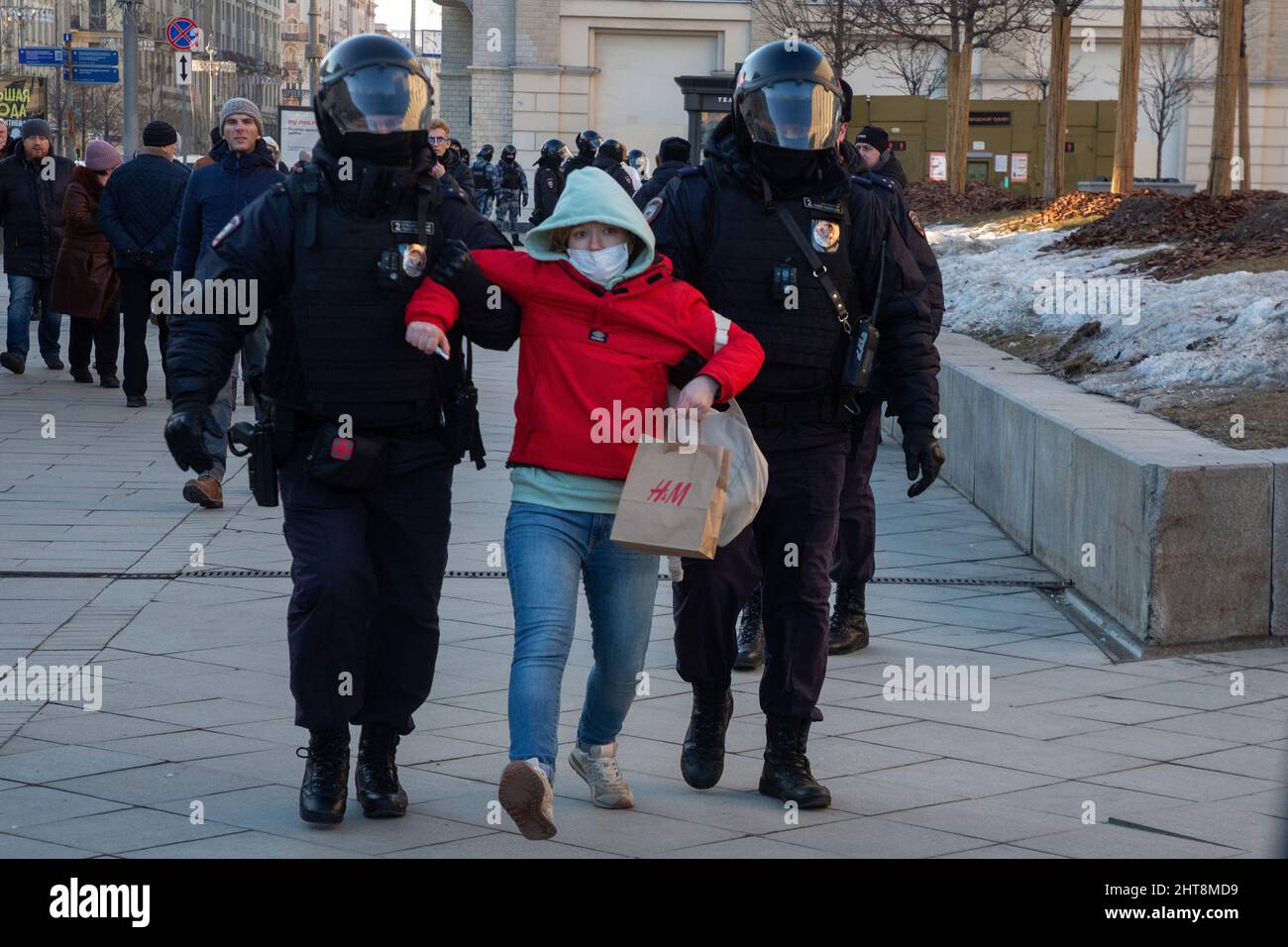 Moscow, Russia. 27th of February, 2022 Police officers detain a woman during an anti-war protest at Pushkinskaya Square in Moscow following Russia's military operation in Ukraine Credit: Nikolay Vinokurov/Alamy Live News Stock Photo