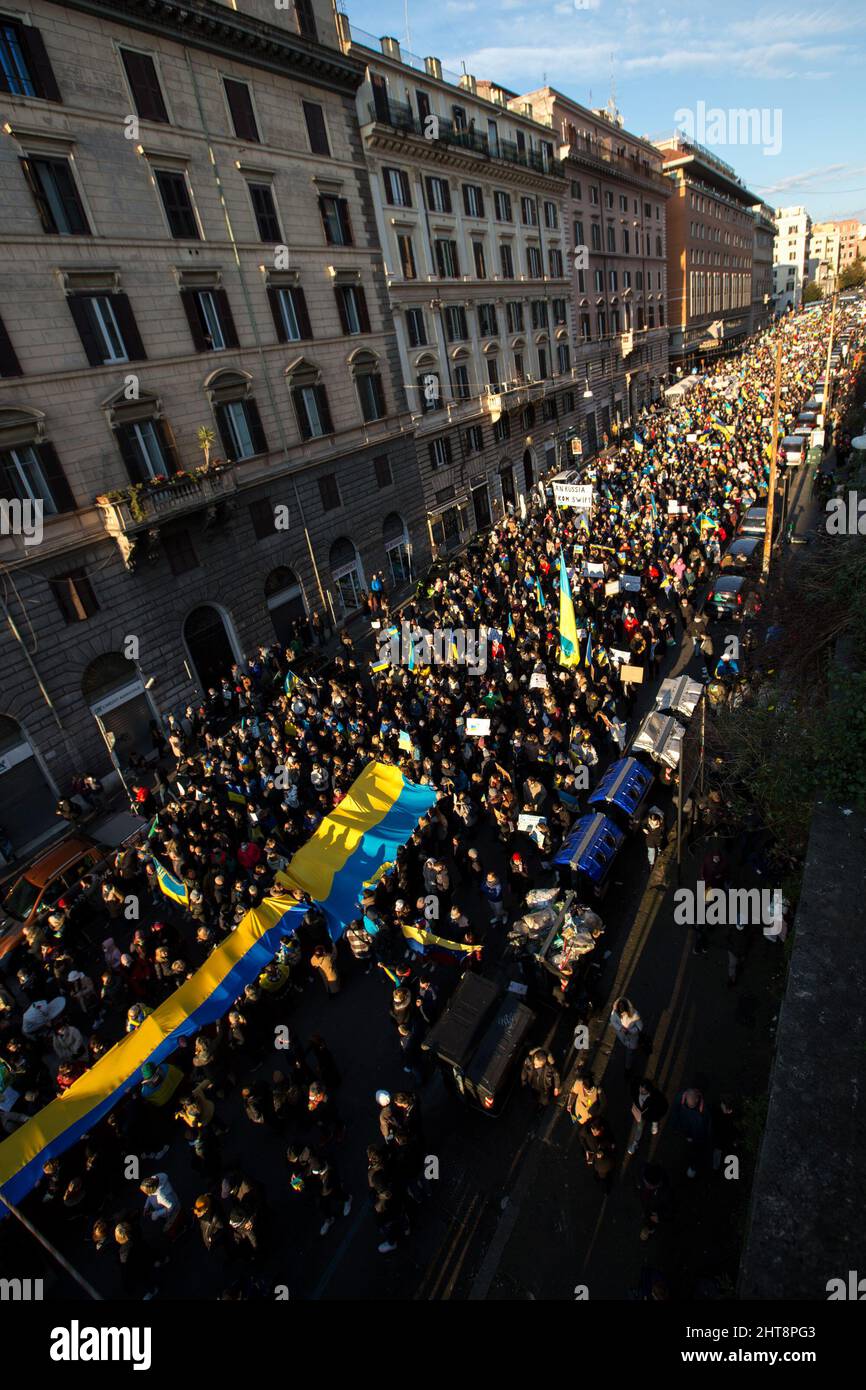 Rome, Italy. 27th Feb, 2022. Today, thousands of people gathered in Piazza della Repubblica and marched to the Fori Imperiali in central Rome to show support and solidarity with the Ukrainian people and to call for immediate peace in Ukraine. The war against Ukraine - and the consequent Russian invasion - was declared in the early morning of the 24th February 2022 by the President of the Russian Federation, Vladimir Putin. Credit: LSF Photo/Alamy Live News Stock Photo