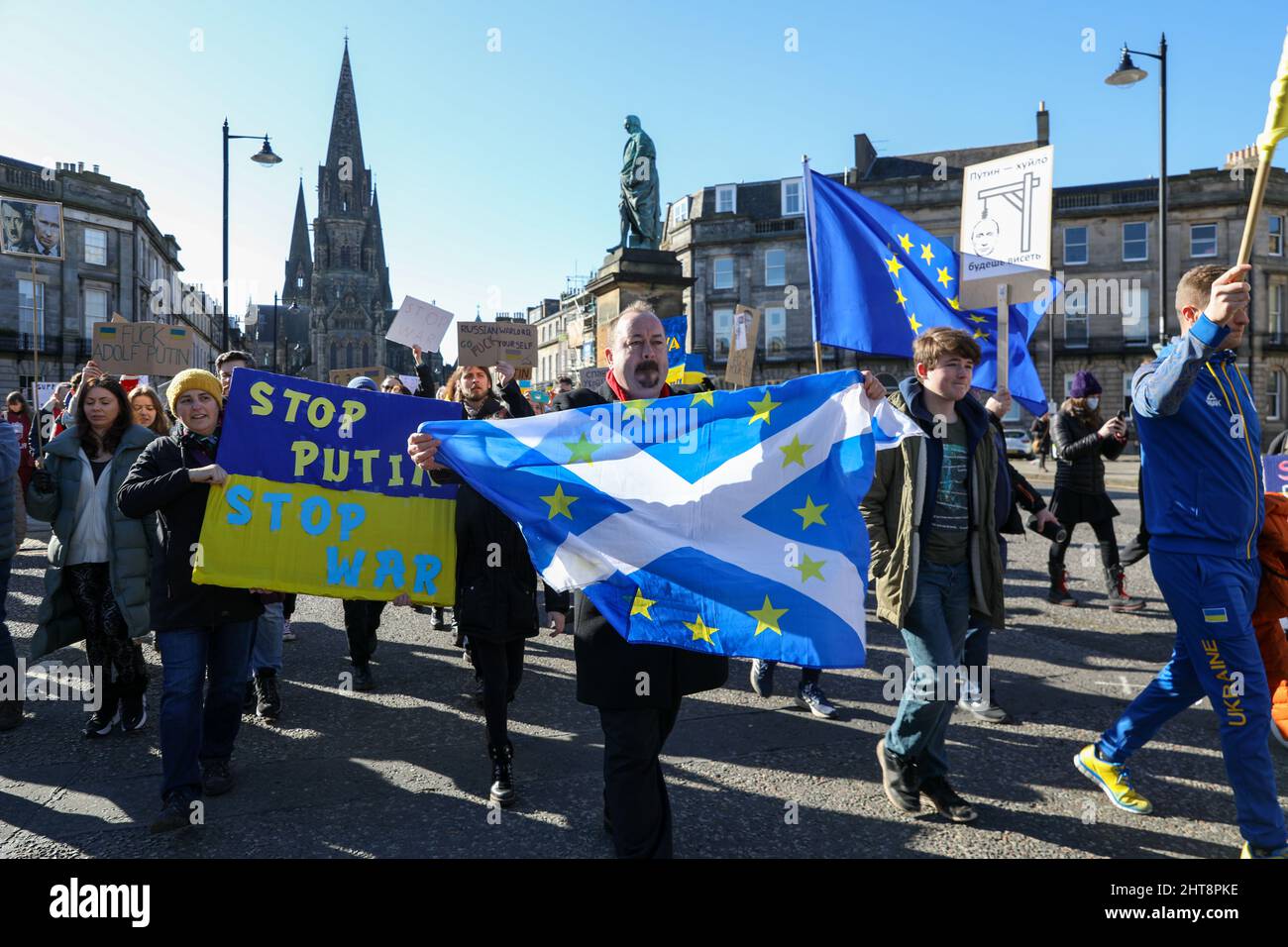 Hundreds of Stand with Ukraine protesters gathered outside the Consulate General of Russia in Edinburgh to demand Putin stops the war. Protesters then marched from the consulate through central Edinburgh to the Scottish Parliament, bringing traffic to a near standstill Credit: David Coulson/Alamy Live News Stock Photo
