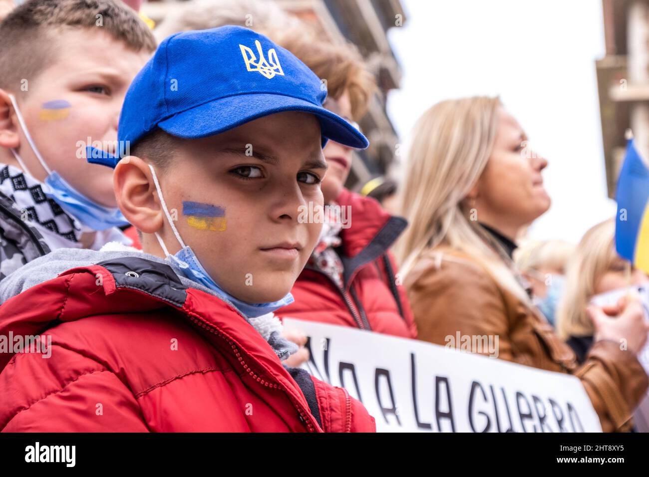 Valencia, Spain; 27th Feb 2022: Demonstrators protest against the war during a demonstration against Russia's invasion of Ukraine. Some children were also present. Credit: Media+Media/Alamy Live News Stock Photo