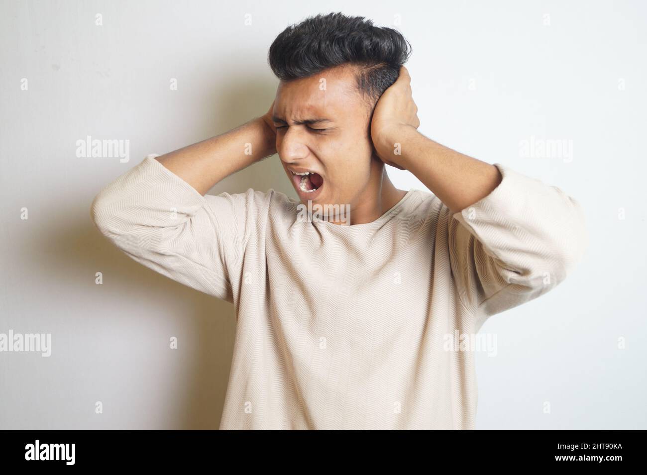 Person with hands on head screaming hi-res stock photography and images ...