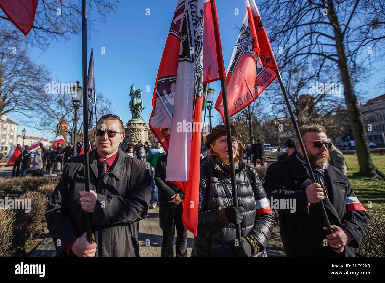 Gdansk, Poland. 27th Feb, 2022. People with Polish flags and nationalist  slogans are seen in Gdansk, Poland on 27 February 2022 Dozen people took  part in the march of Cursed soldiers wich