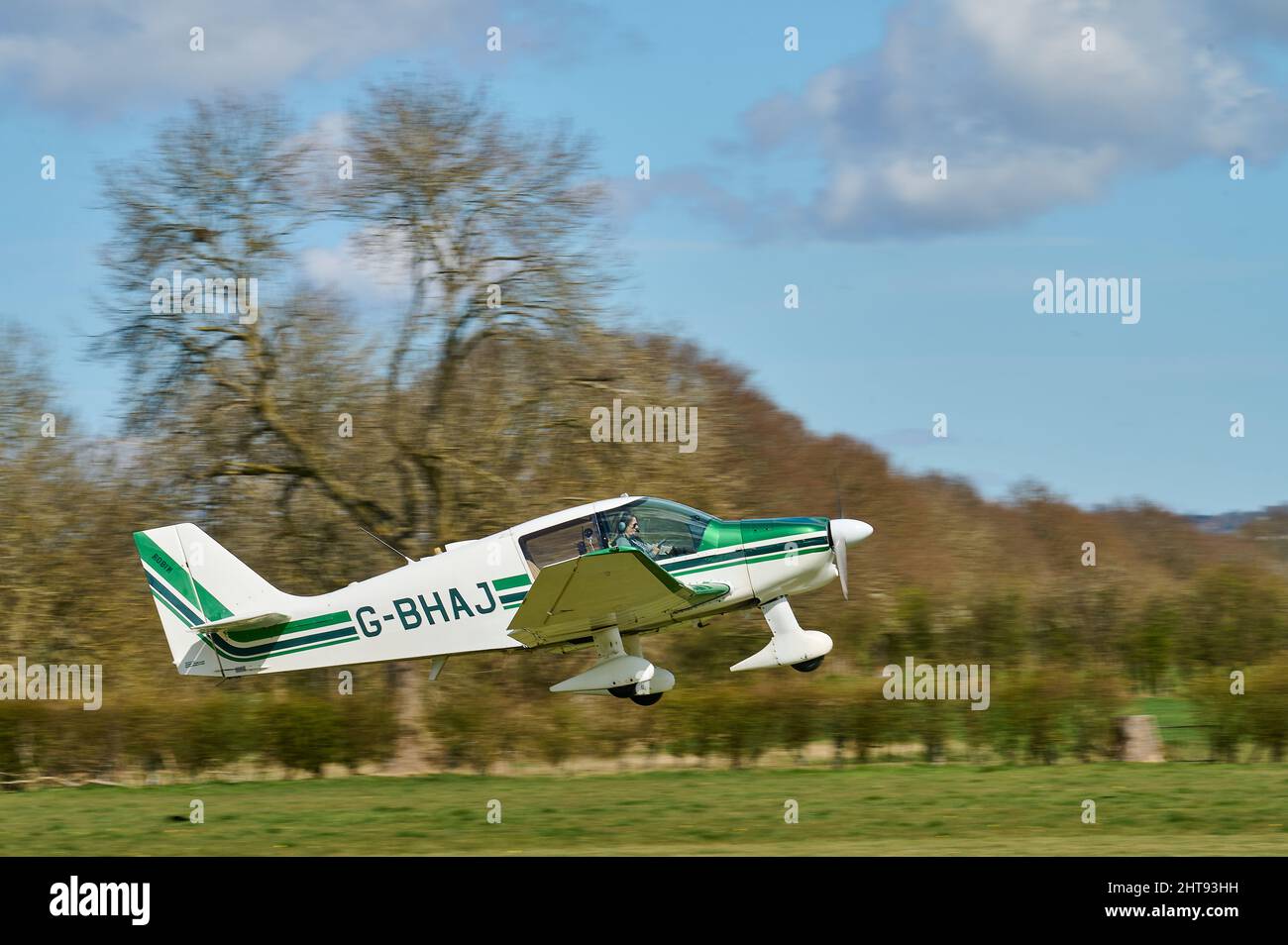 Private aircraft flying at Headcorn Airfield Stock Photo