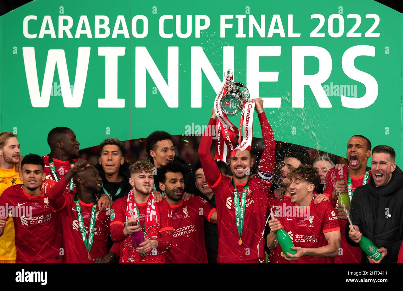 Liverpool players celebrate after winning the Carabao Cup final at ...