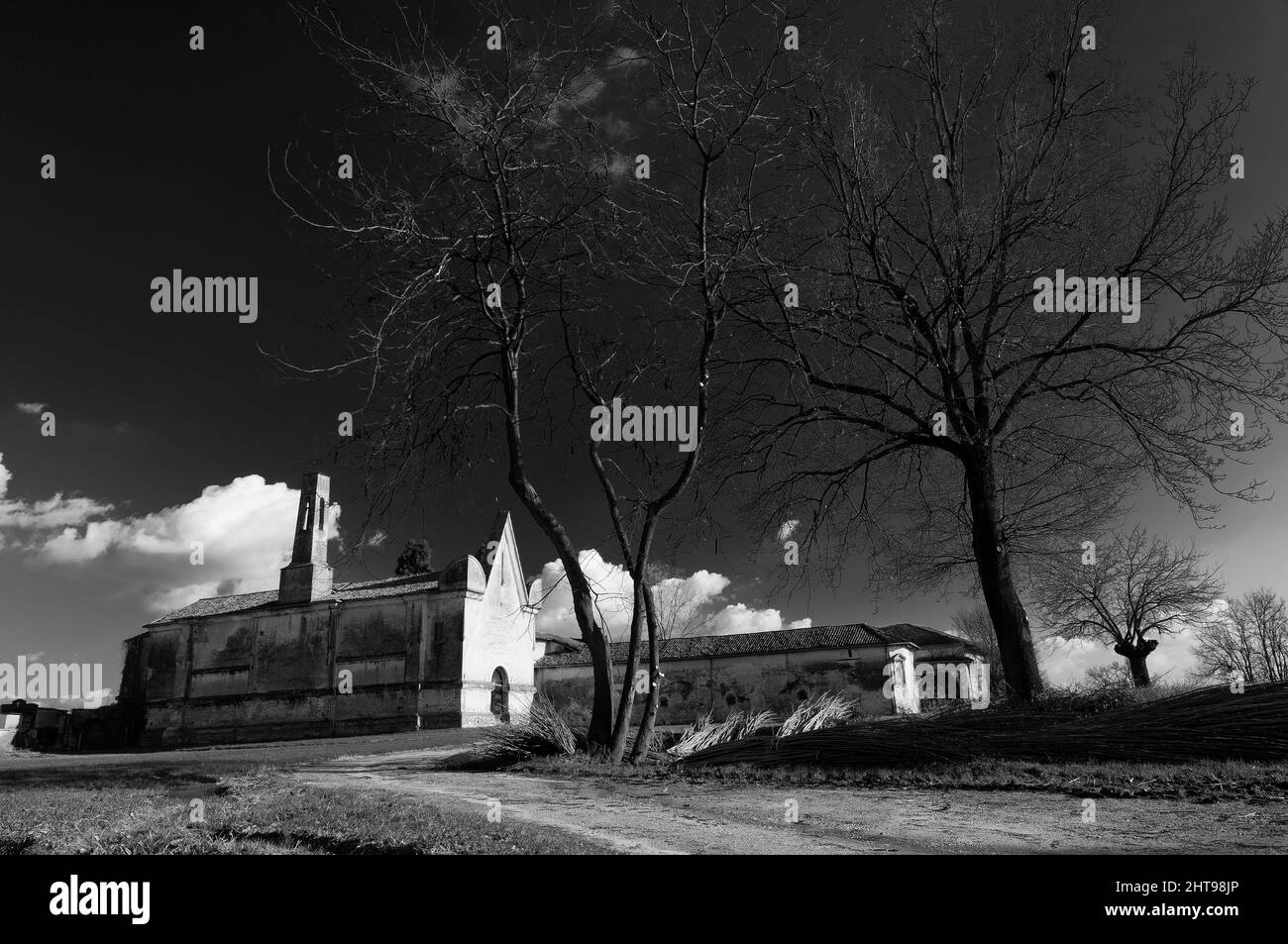 Grayscale shot of an old stone church Stock Photo - Alamy