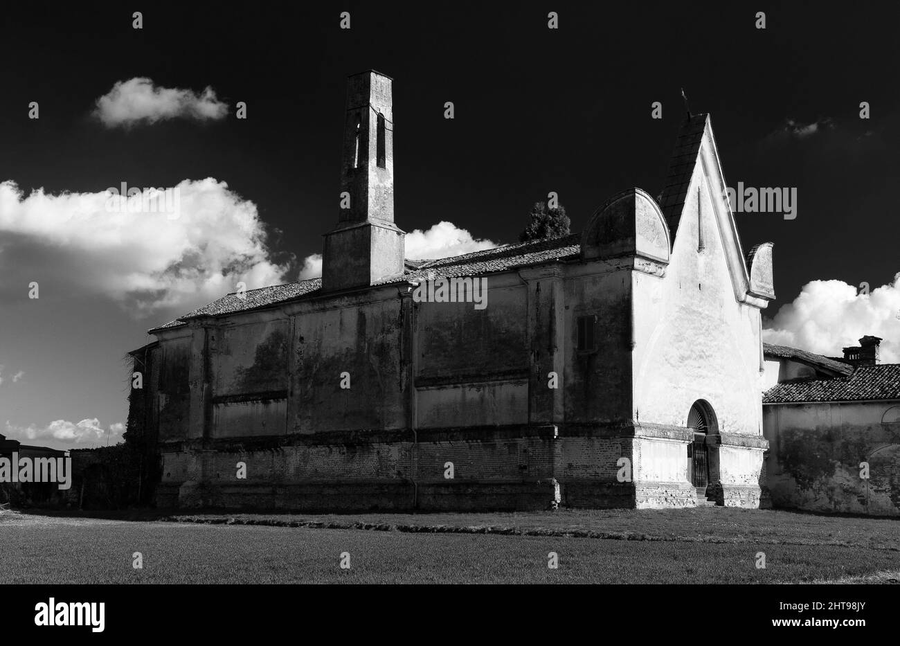 Grayscale shot of an old stone church Stock Photo - Alamy