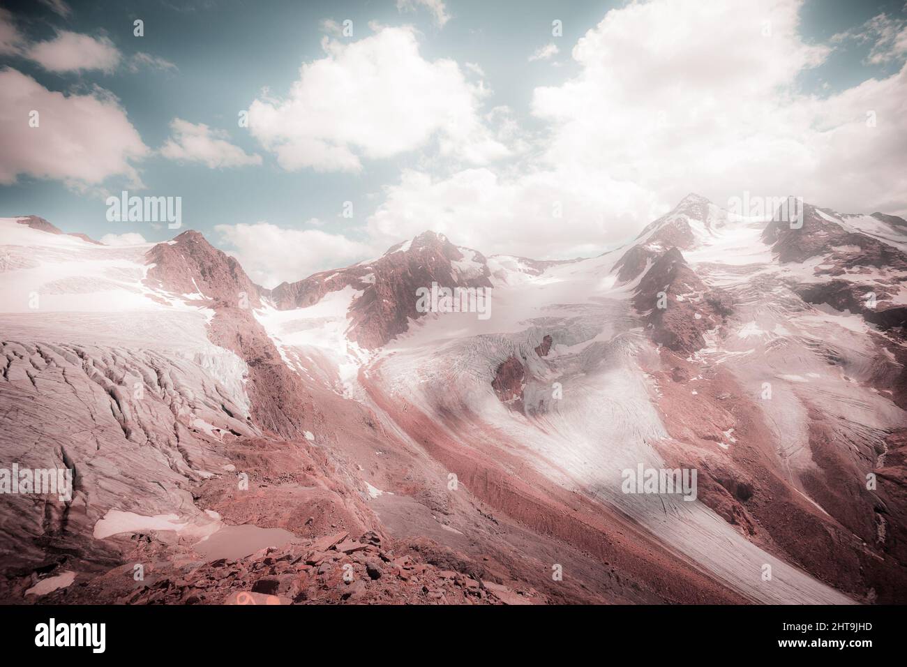 Fantasy pink effect color of the Palla Bianca massif big glaciers Stock Photo