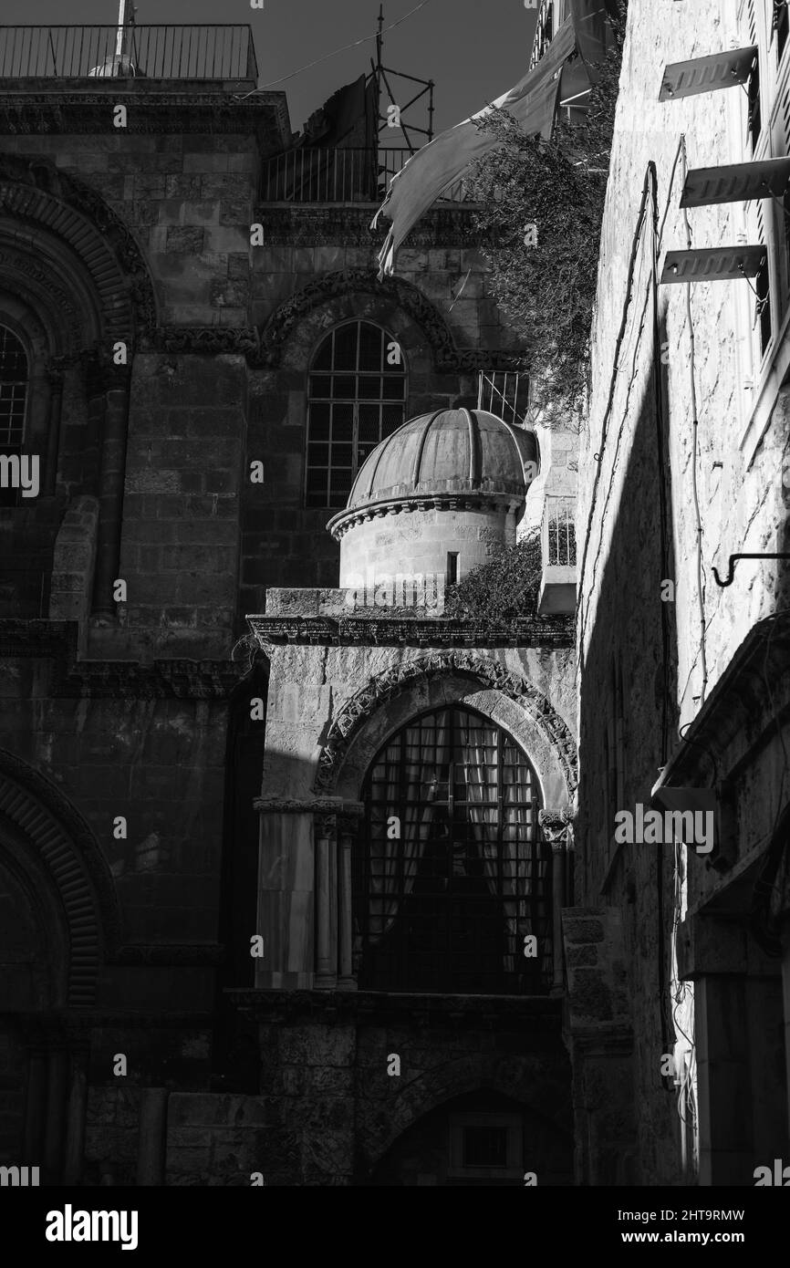 Low angle grayscale shot of an old Church of the Holy Sepulchre Stock ...