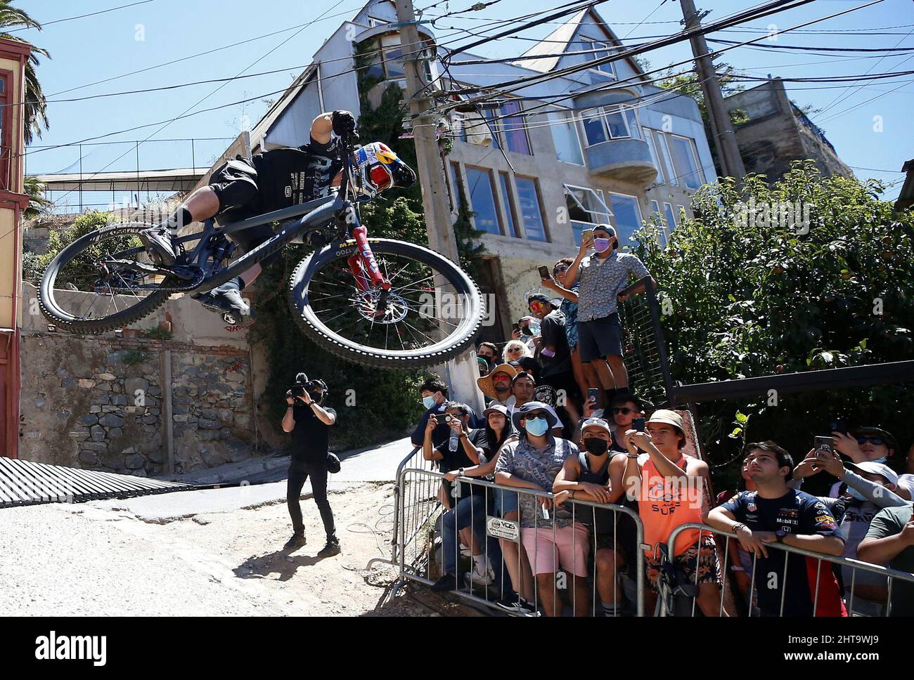 A competitor rides his bike during the Valparaiso Cerro Abajo urban  downhill mountain bike race in Valparaiso, Chile February 27, 2022.  REUTERS/Rodrigo Garrido Stock Photo - Alamy