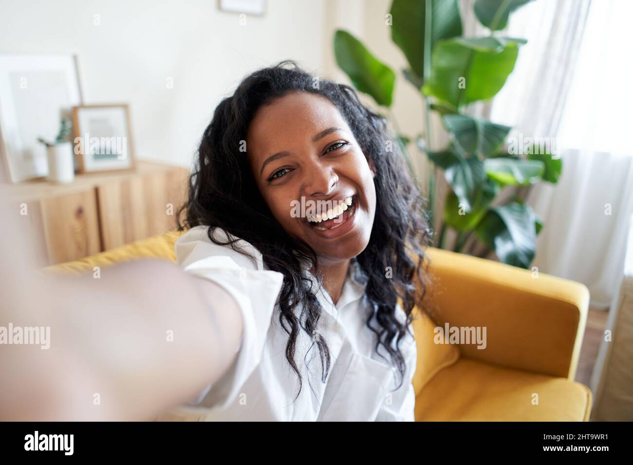 Woman winking and smiling hi-res stock photography and images - Alamy