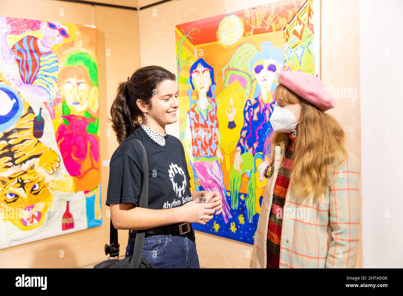 The Audience during an art exhibition opening in the vibrant Stock Photo Alamy
