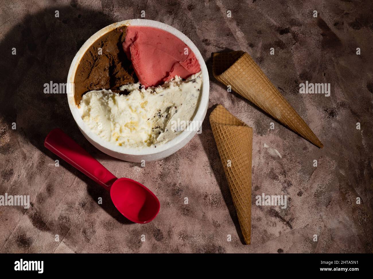 Different flavors of ice cream with waffle cones Stock Photo - Alamy