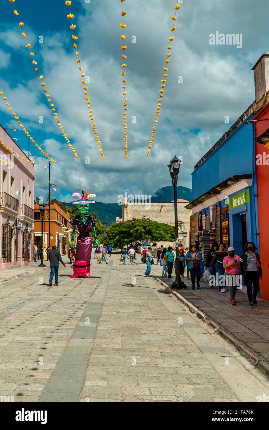 Vertical shot of people walking in the streets of Mexico on the day of the dead Stock Photo