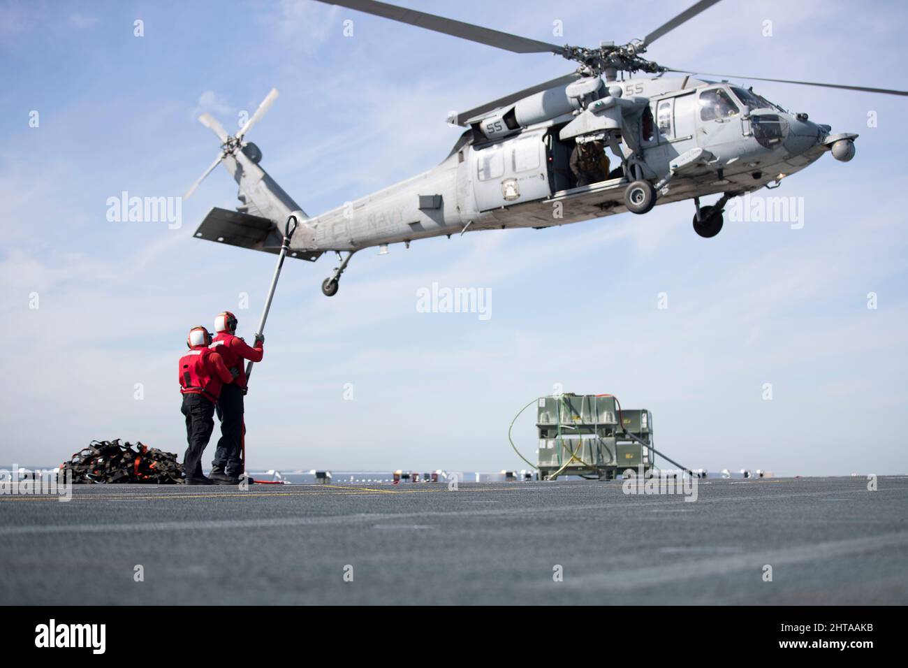 220225-N-CZ759-1159 PACIFIC OCEAN (Feb. 25, 2022) – An MH-60S Sea Hawk ...