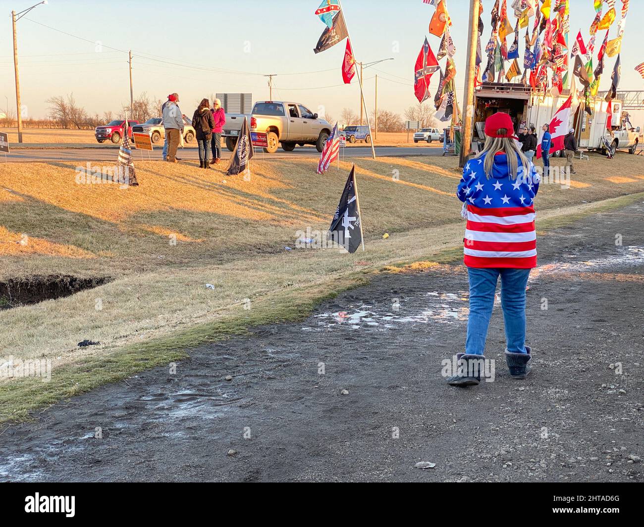 Big Cabin, Oklahoma - February 27,2022 - People supporting the so-called American Freedom Convoy or People's Convoy watch as the trucks drive through. Stock Photo