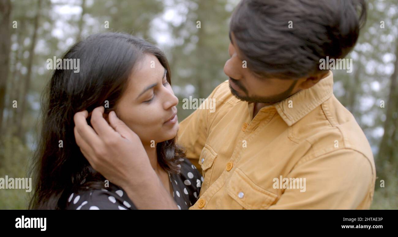 Closeup of a beautiful indian couple in the park Stock Photo - Alamy
