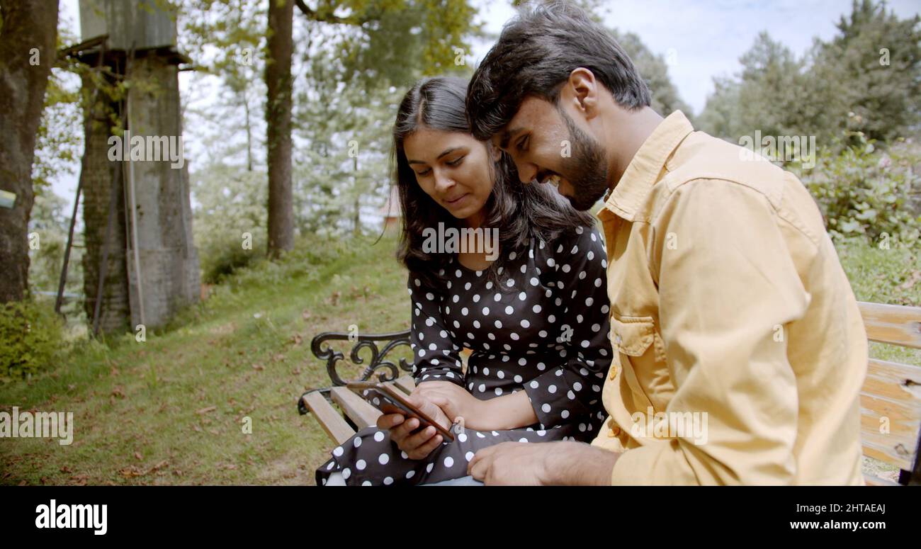 Closeup of a beautiful indian couple in the park Stock Photo - Alamy