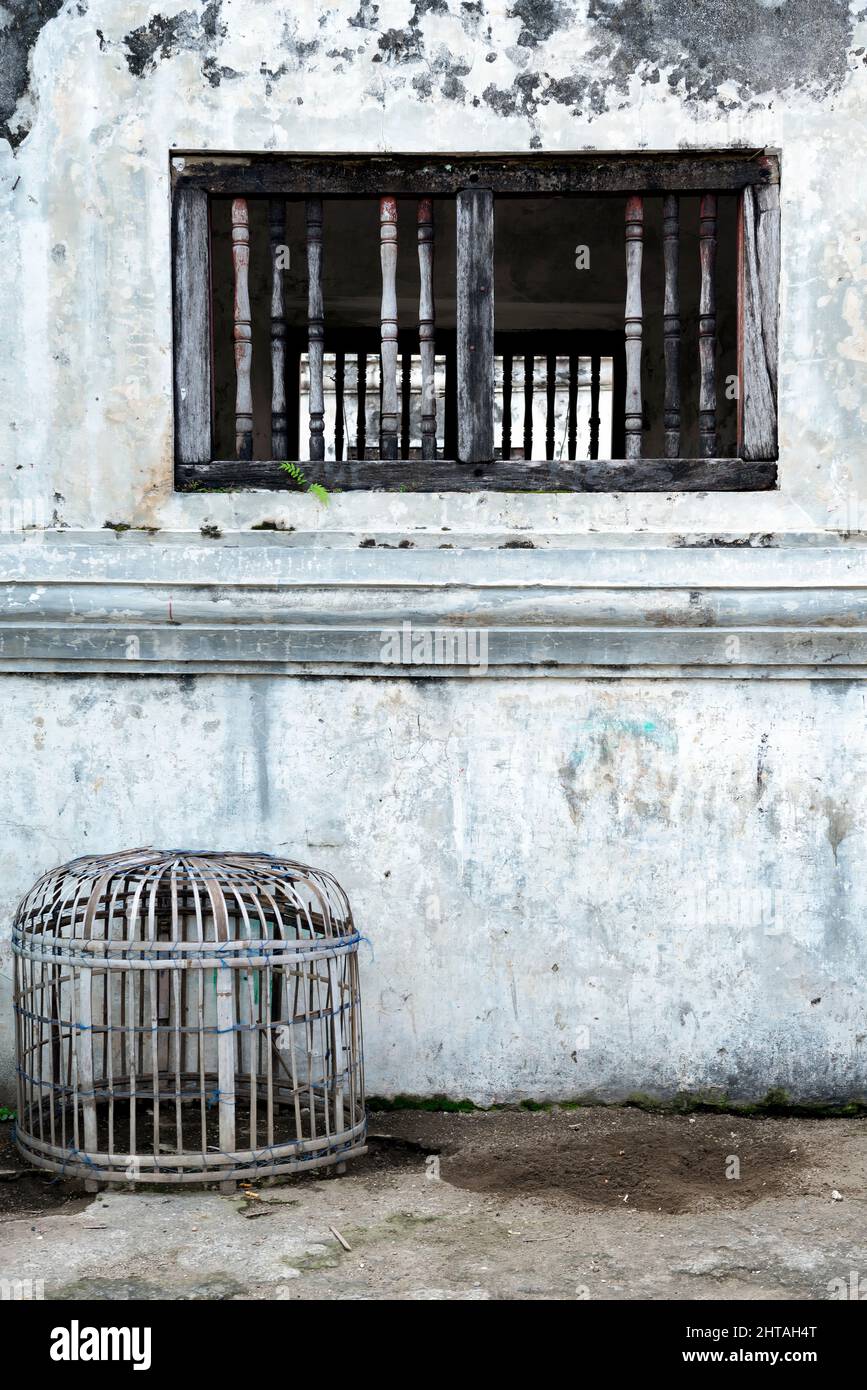 Empty bamboo cage used in rooster fights in Indonesia Stock Photo