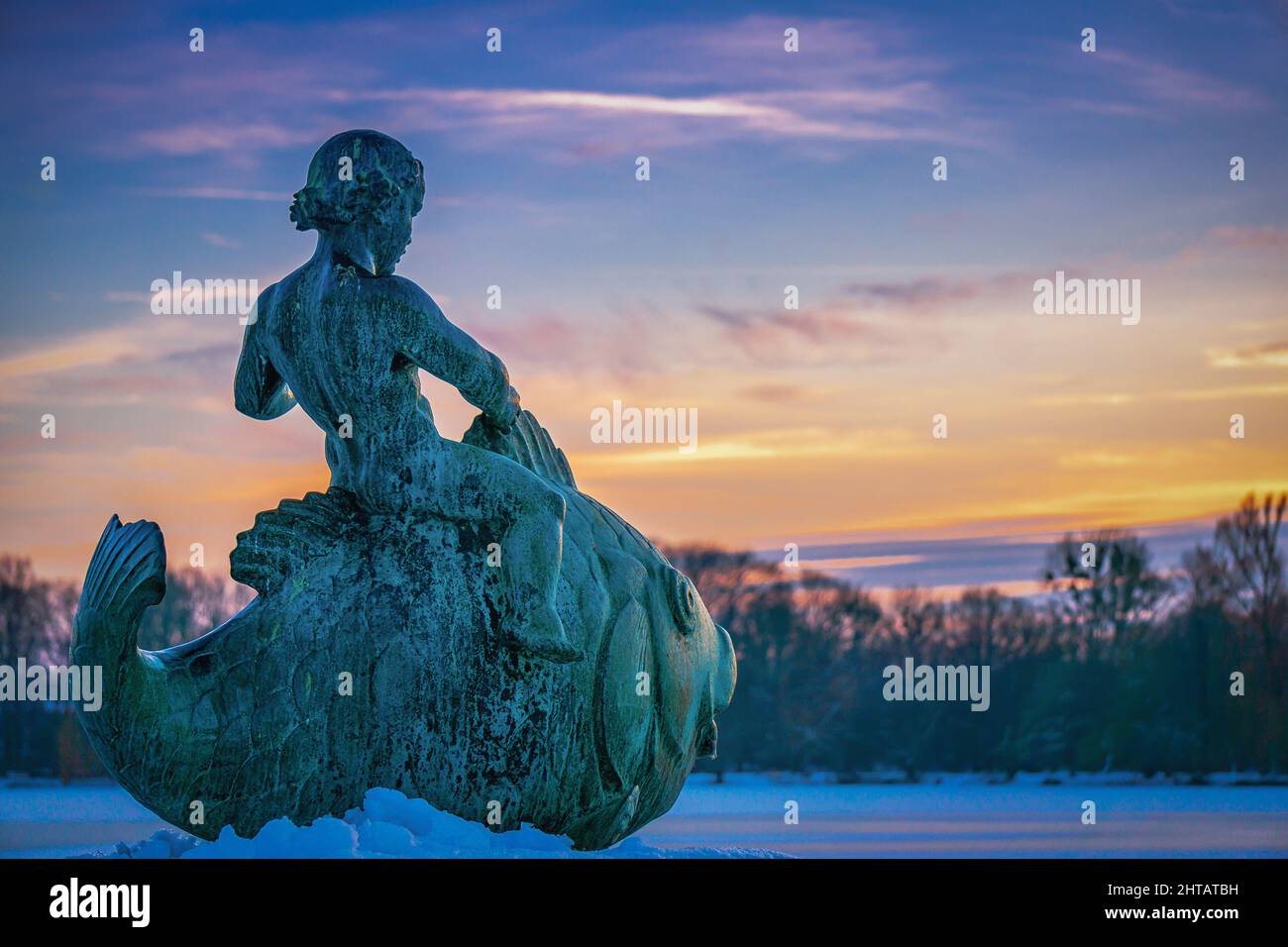 Beautiful view of a statue at Masch lake in Hanover in winter Stock Photo