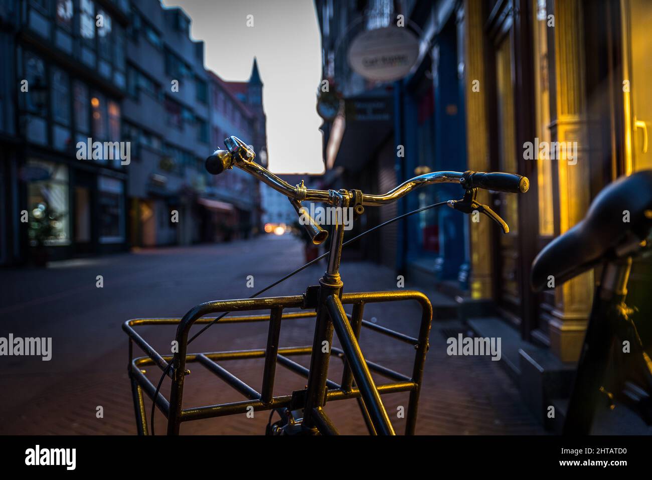 Closeup of an old cargo bike parked on the streets in the center of Hanover Germany Stock Photo