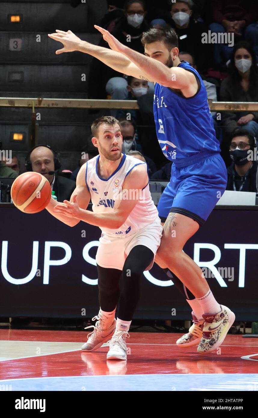 Jon Axel Gudmundsson (Iceland) (L) thwarted by  Amedeo Tessitori (Italy) during the FIBA World Cup 2023 qualifiers game Italy Vs. Iceland at the Paladozza sports palace in Bologna, February 27, 2022 - Photo: Michele Nucci Stock Photo