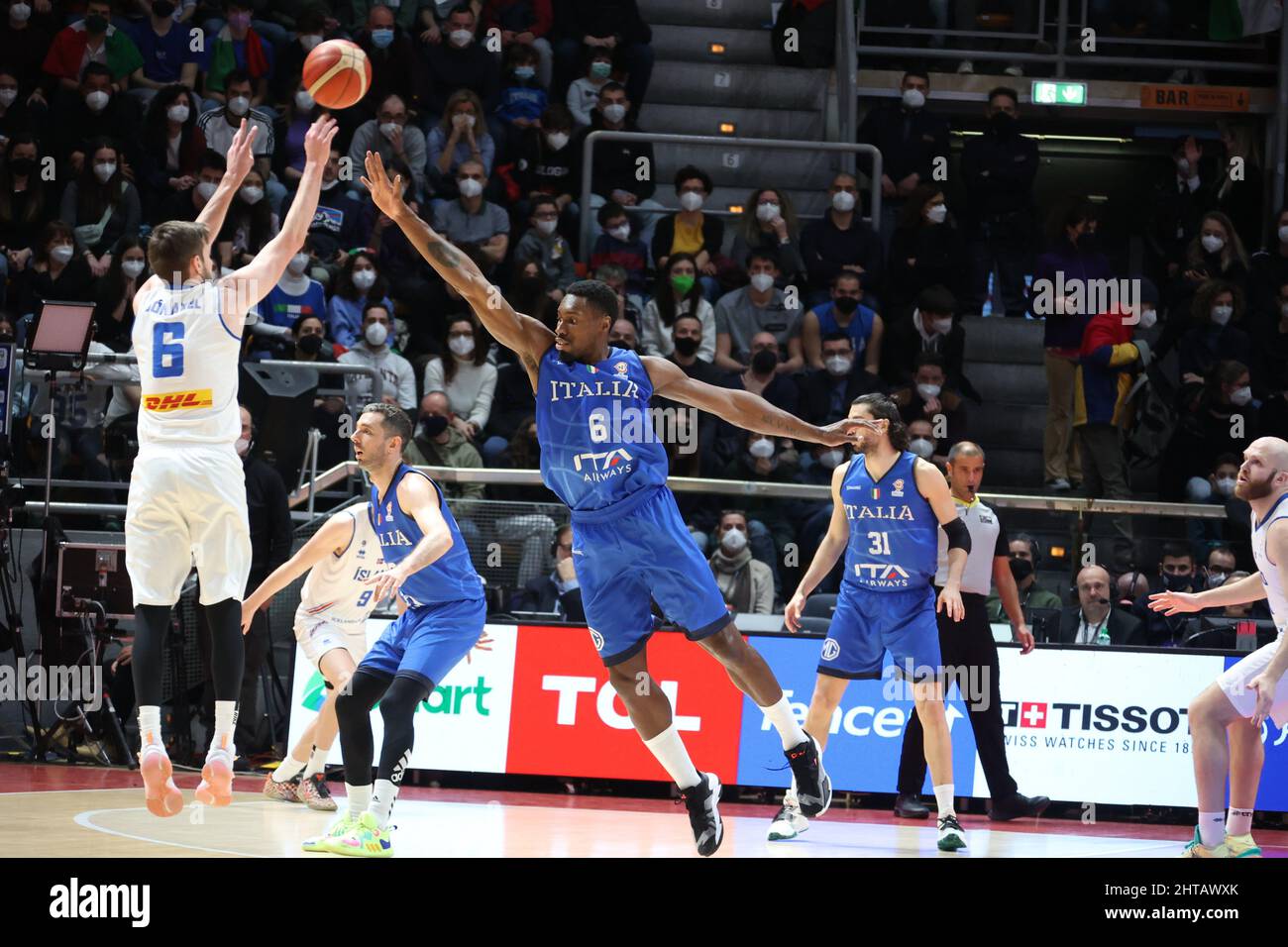 Jon Axel Gudmundsson (Iceland) (L) thwarted by  Paul Biligha (Italy) during the FIBA World Cup 2023 qualifiers game Italy Vs. Iceland at the Paladozza sports palace in Bologna, February 27, 2022 - Photo: Michele Nucci Stock Photo