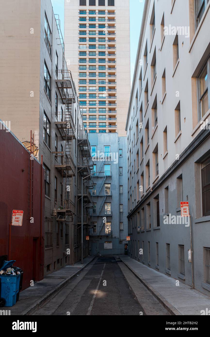 Vertical shot of the narrow street between two buildings in San ...