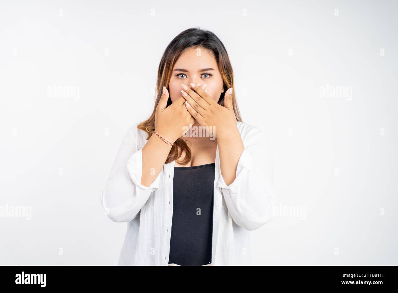 Hands covering mouth speech hi-res stock photography and images - Alamy