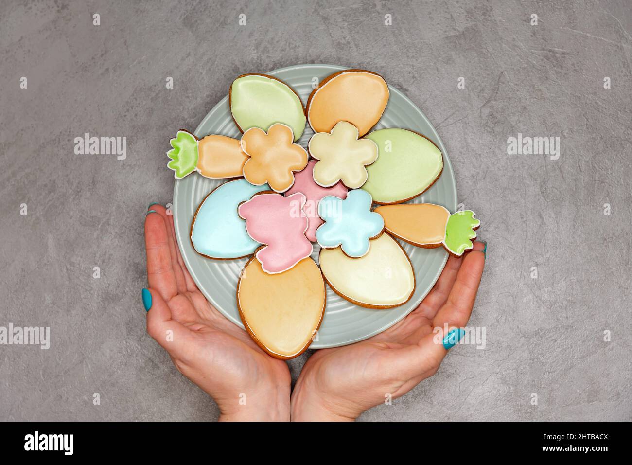 Beautiful glazed Easter cookies Easter festive table setting Stock