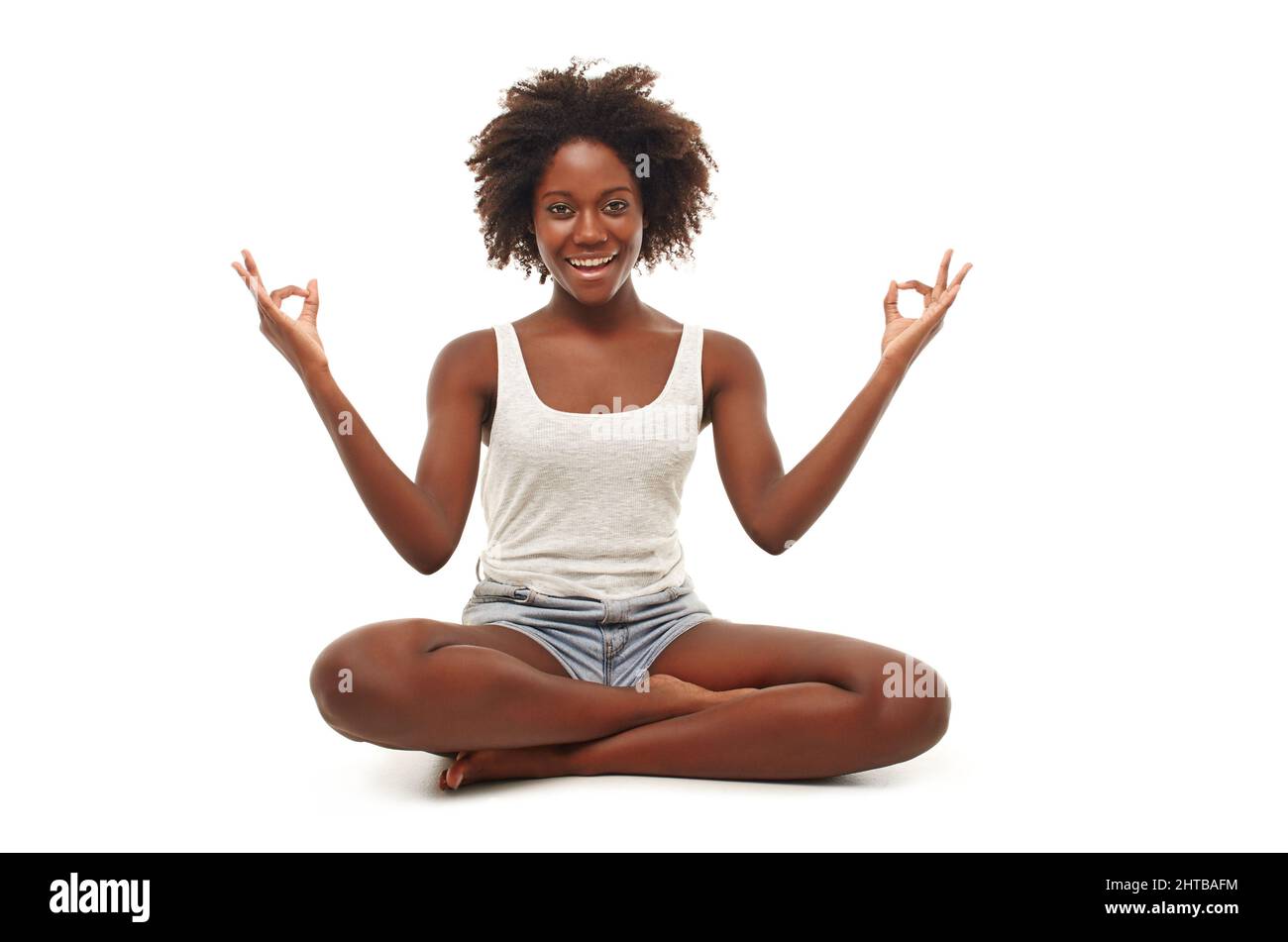 For body and mind. A young woman in a yoga position. Stock Photo