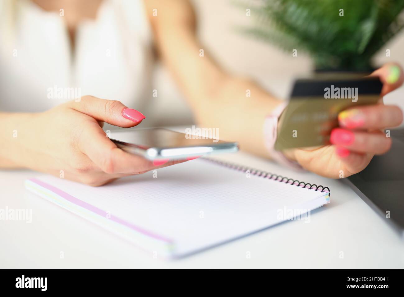 Lady doing outpayment Stock Photo