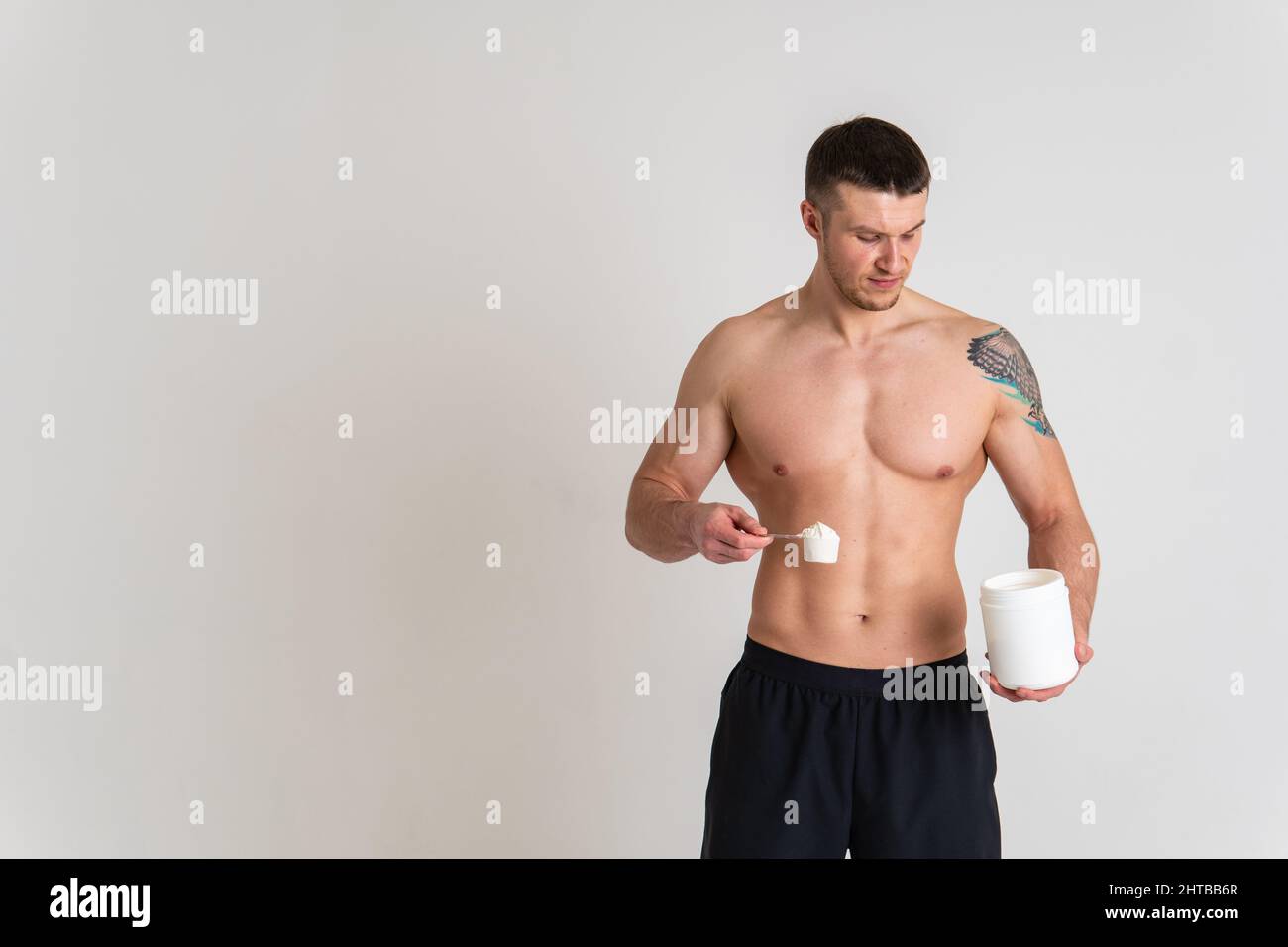 Fitness protein jars white on white background bodybuilder powder