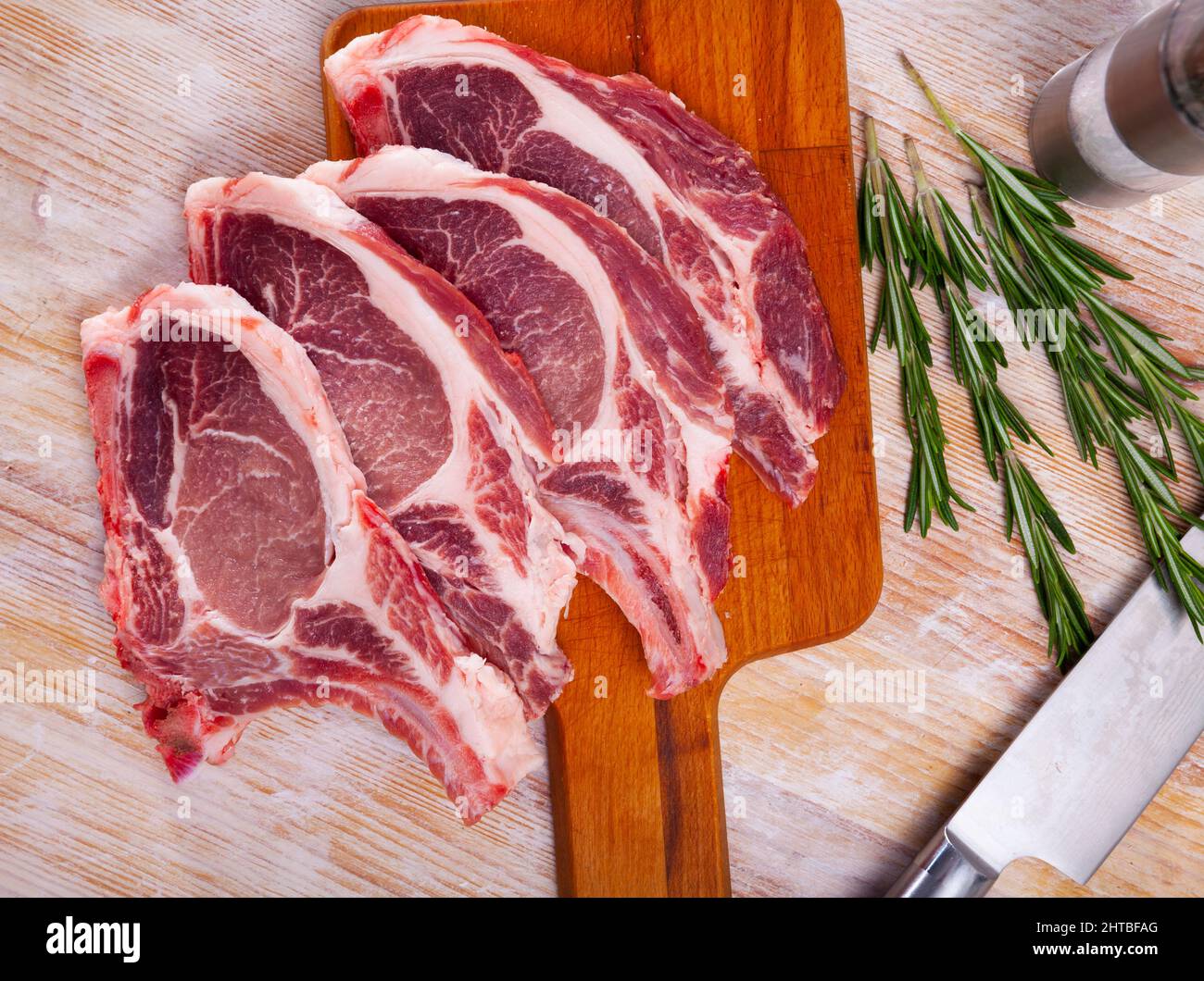 Preparation of raw pork loin Stock Photo Alamy