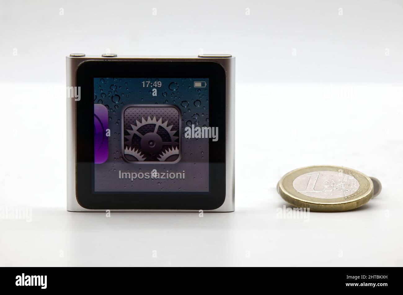 Apple Ipod Nano size comparison with one Euro coin. Vintage technology Stock Photo