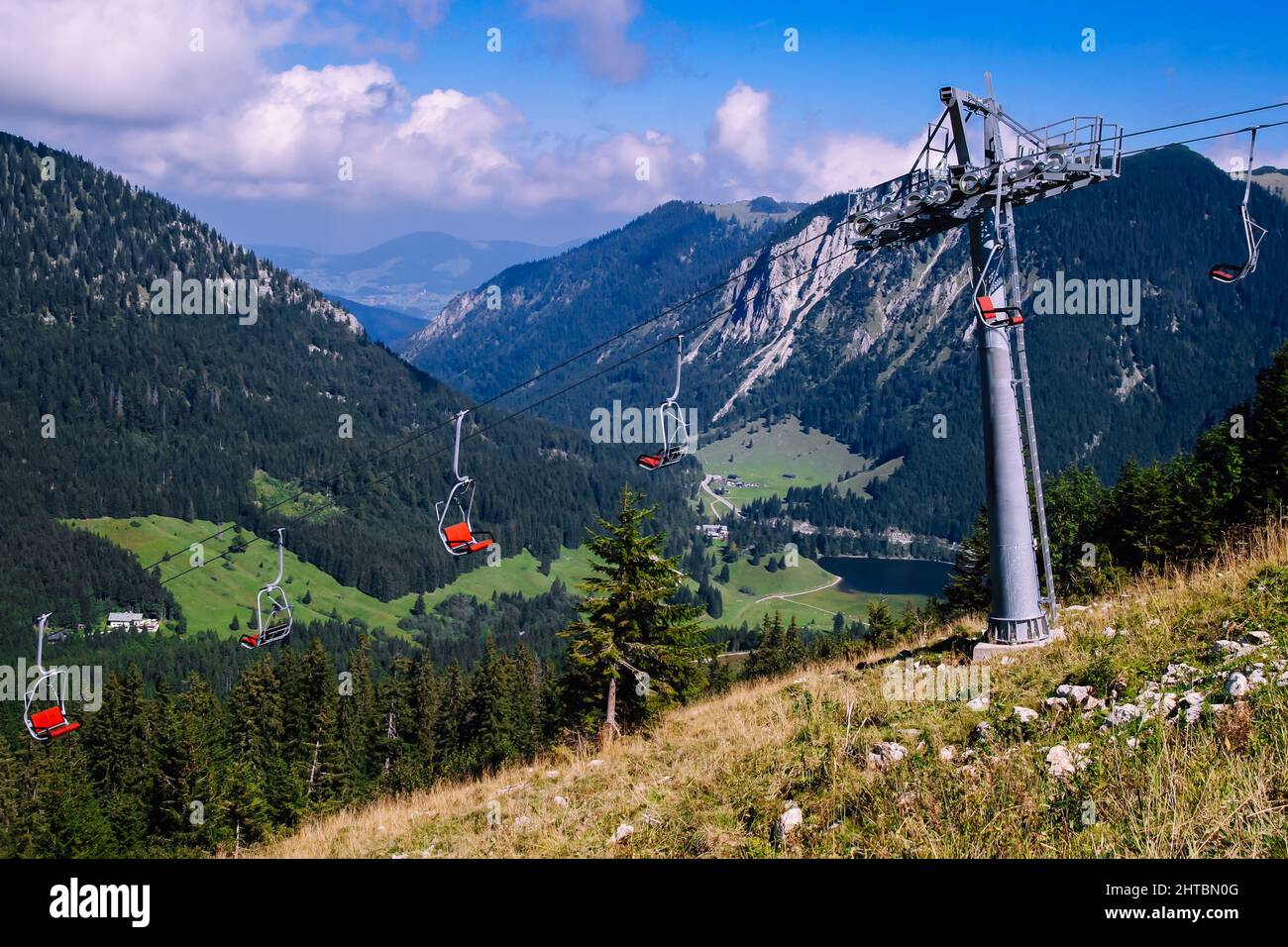 Ropeway in the middle of mountains Stock Photo - Alamy