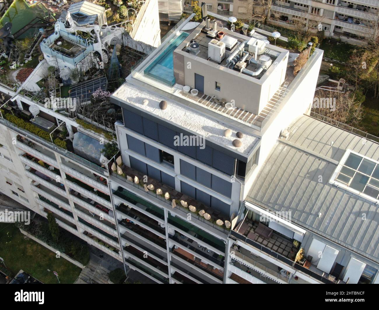 Picture of Aerial shot of an upscale apartment building with a swimming pool on ...